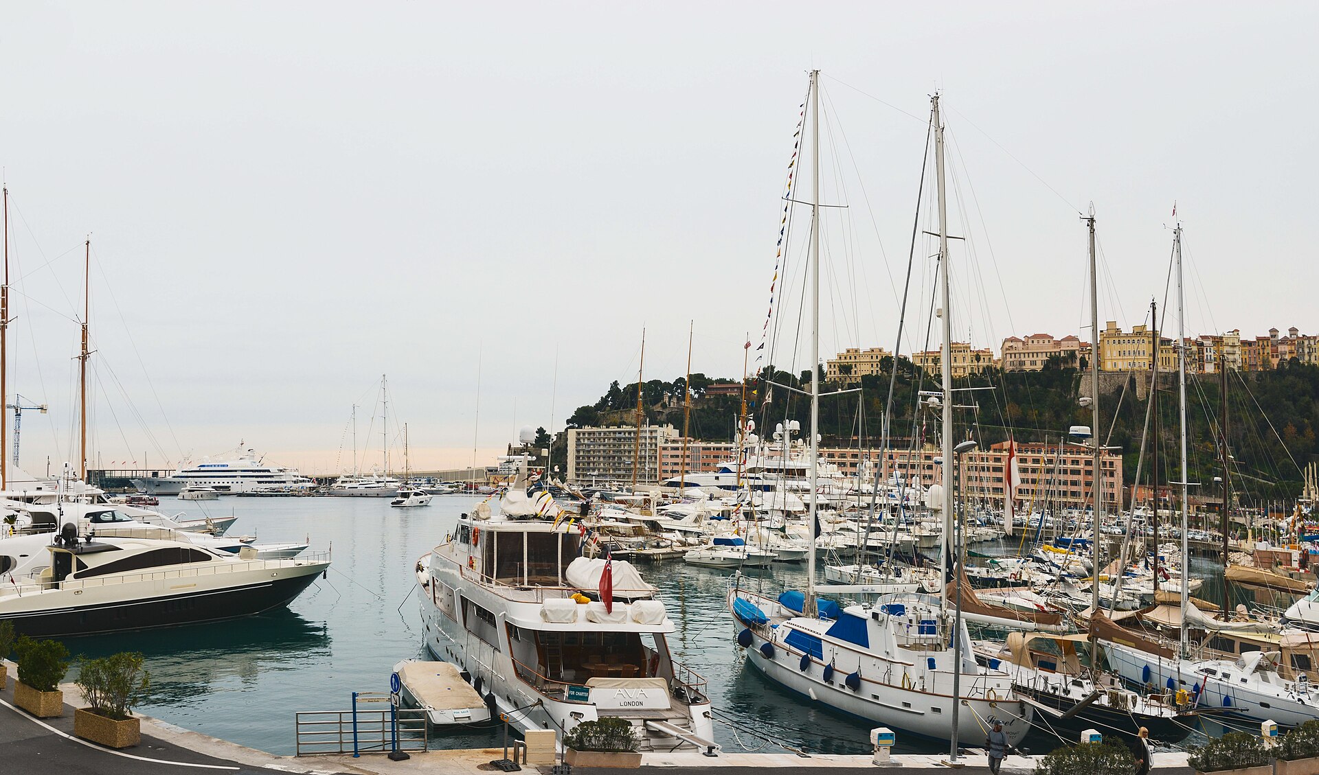 Panorama of Port Hercules with yachts moored below Monaco-Ville
